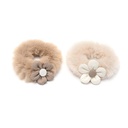 SCUNZI PELUCHE CON APLIQUE DE FLOR