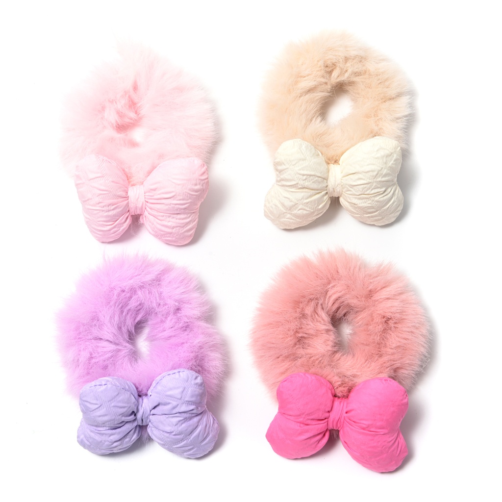 SCUNZI PELUCHE CON MOÑO