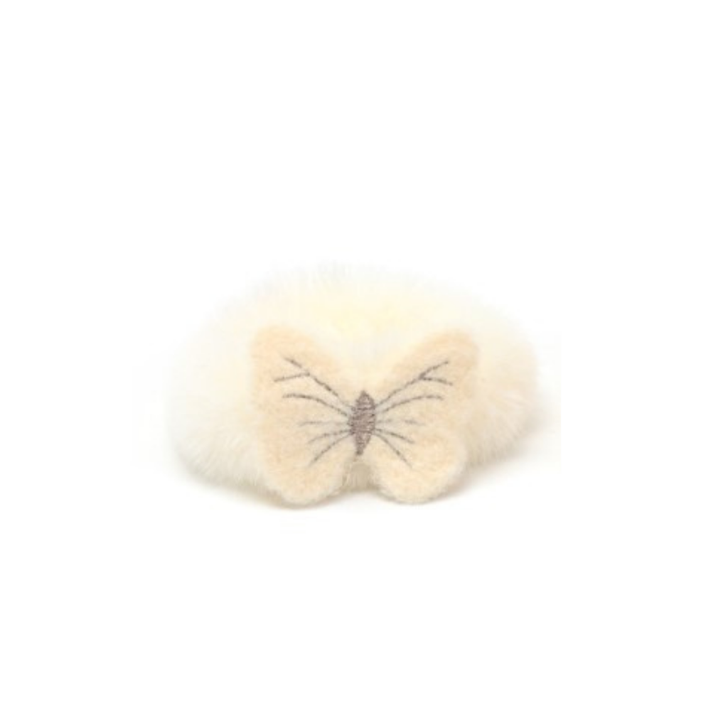 SCUNZI DE PELUCHE CON APLIQUE DE MARIPOSA