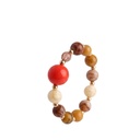 PULSERA ELÁSTICA TONOS CÁLIDOS CAREY